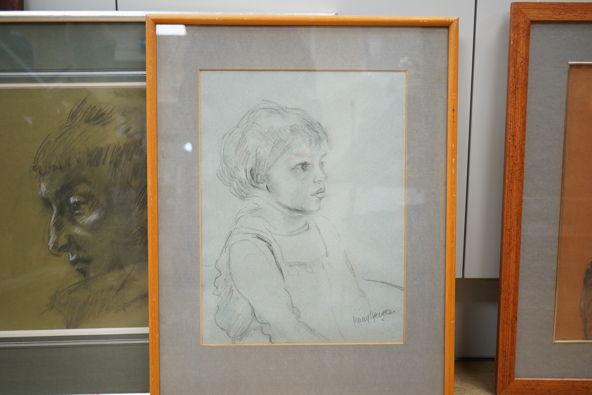 Jenny Spencer, four mixed media’s and an oil on canvas, portraits to include a young boy, three signed, one with label verso, largest 49 x 35cm. Condition - fair to good